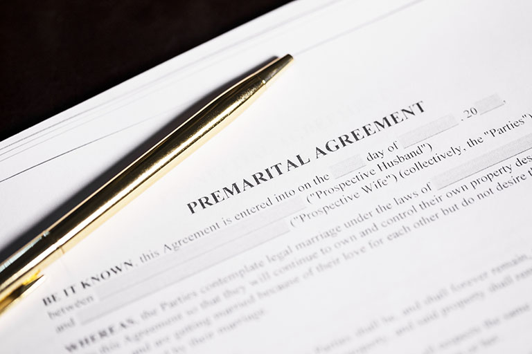 Premarital agreement form being reviewed